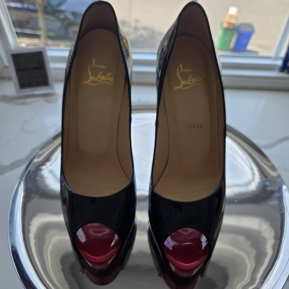 Christian Louboutin patent leather pump. New Very Prive Patent Red Sole Pump